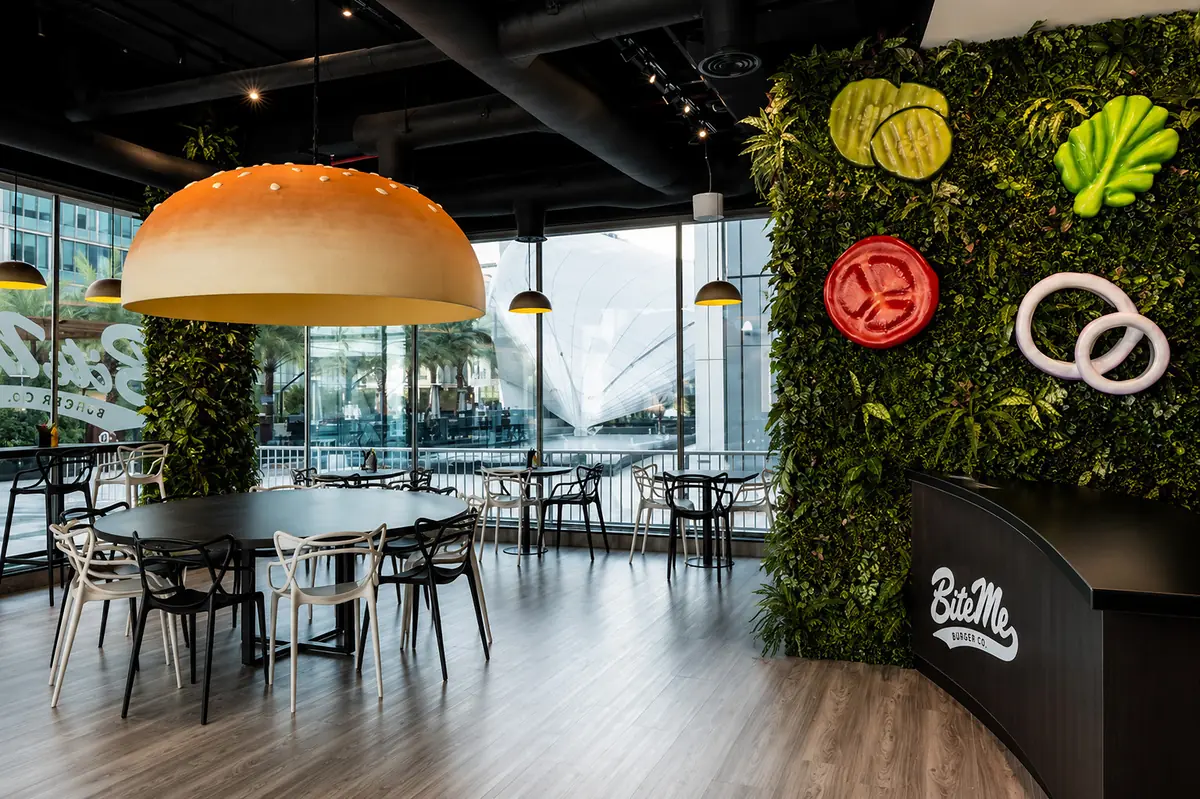 Bite Me Burger in DIFC with its dome lamp and living wall
