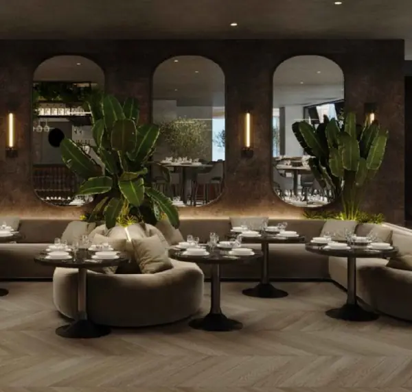 Club 58 entrance with olive trees at Yas Island